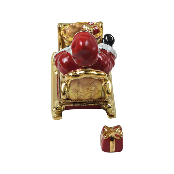 Load image into Gallery viewer, Rochard "Santa in Red Sleigh with Removable Present" Limoges Box
