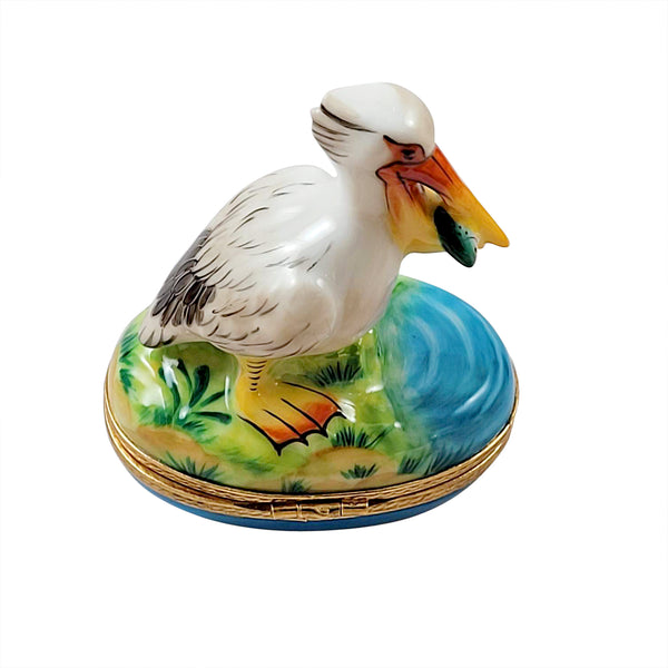 Load image into Gallery viewer, Rochard "Pelican with Removable Fish" Limoges Box