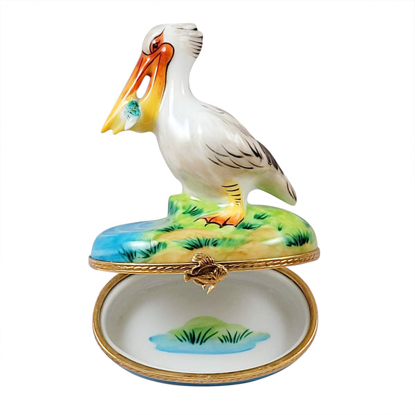 Load image into Gallery viewer, Rochard "Pelican with Removable Fish" Limoges Box