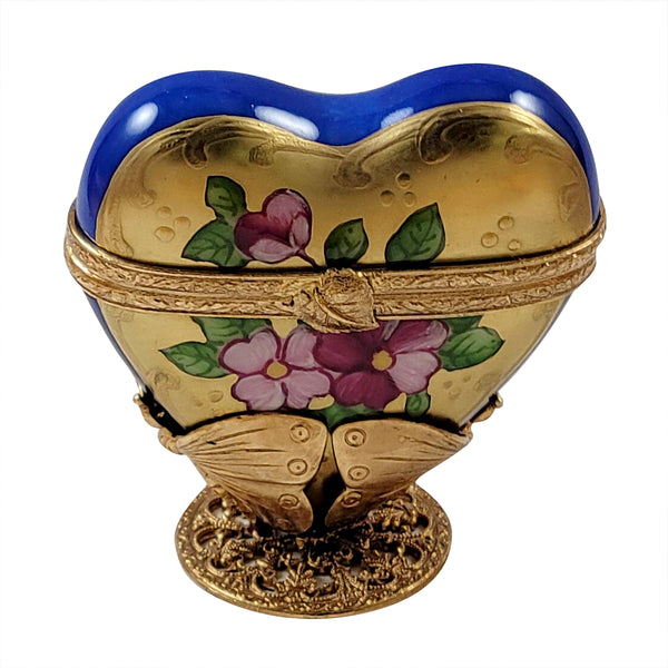 Load image into Gallery viewer, Rochard "Blue and Gold Heart on Butterfly Brass Stand" Limoges Box
