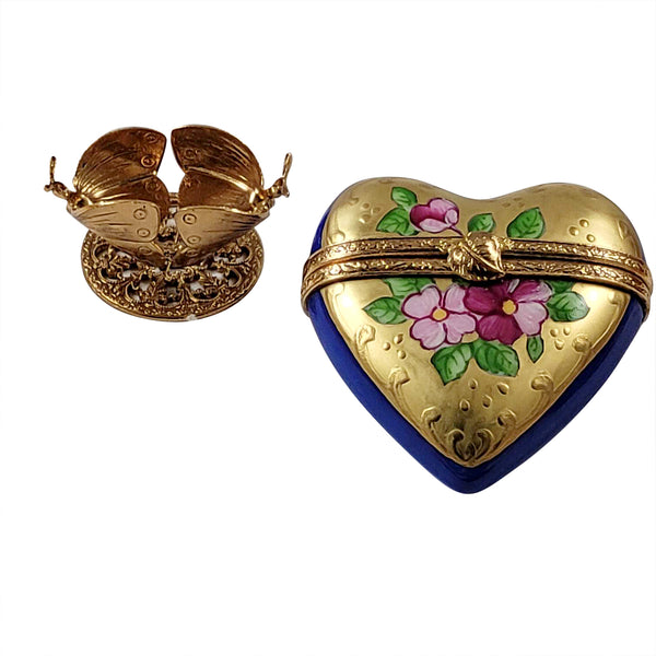 Load image into Gallery viewer, Rochard "Blue and Gold Heart on Butterfly Brass Stand" Limoges Box