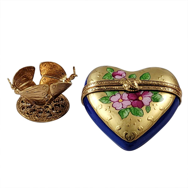 Load image into Gallery viewer, Rochard "Blue and Gold Heart on Butterfly Brass Stand" Limoges Box
