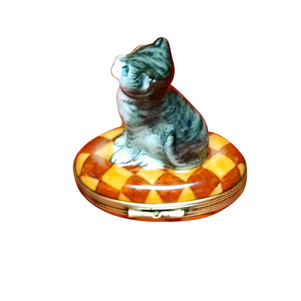 Load image into Gallery viewer, Small Gray & White Cat with Red Collar on Yellow & Brown Rug Limoges Box