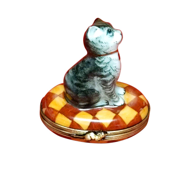 Load image into Gallery viewer, Small Gray & White Cat with Red Collar on Yellow & Brown Rug Limoges Box