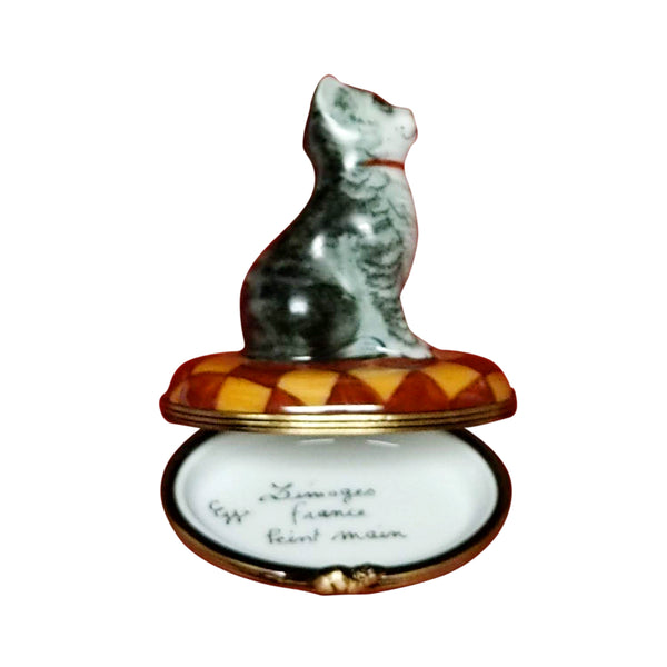 Load image into Gallery viewer, Small Gray & White Cat with Red Collar on Yellow & Brown Rug Limoges Box