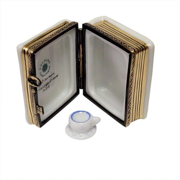 Load image into Gallery viewer, Rochard "Alice In Wonderland Book with Tea Cup" Limoges Box