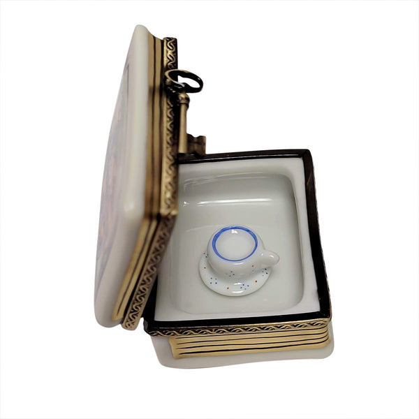 Load image into Gallery viewer, Rochard "Alice In Wonderland Book with Tea Cup" Limoges Box