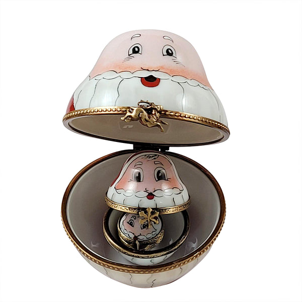 Load image into Gallery viewer, Rochard "Old World Nesting Stacking Santas" Limoges Box