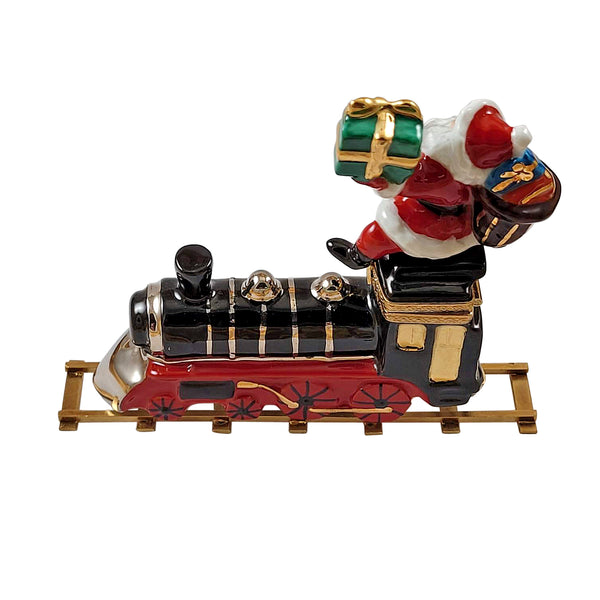 Load image into Gallery viewer, Rochard "Santa on Train with Brass Track" Limoges Box