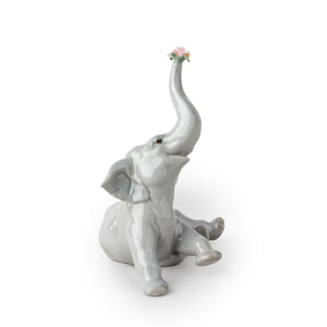 Lladro Baby Elephant with Pink Flower Figurine