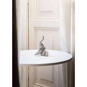 Lladro Baby Elephant with Pink Flower Figurine