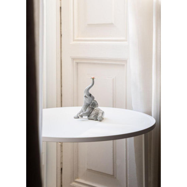 Load image into Gallery viewer, Lladro Baby Elephant with Pink Flower Figurine
