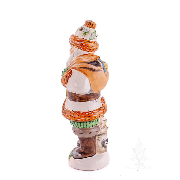 Load image into Gallery viewer, Vaillancourt Folk Art - Santa Holding Red Cardinal - Chalkware Figurine
