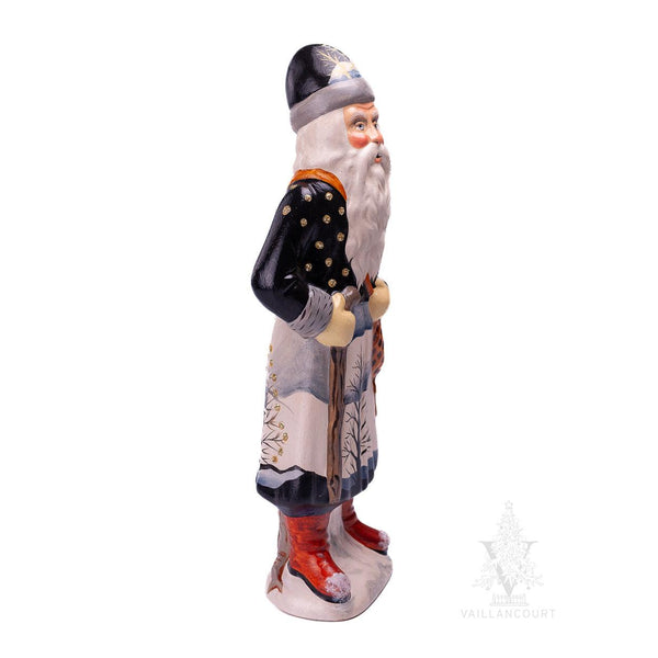 Load image into Gallery viewer, Vaillancourt Folk Art - Father Christmas on Winter’s Night Hike - Chalkware Figurine
