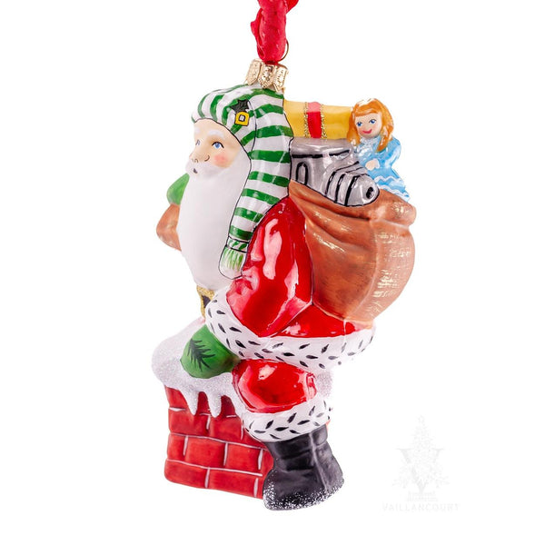 Load image into Gallery viewer, Vaillancourt Folk Art - Santa Delivering Gifts Down The Chimney - Christmas Ornament
