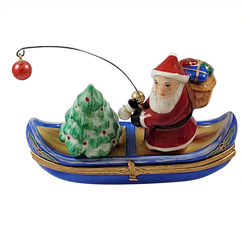 Santa with Tree in Canoe Limoges Box