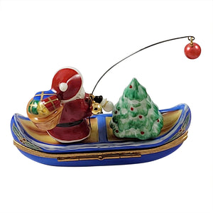 Santa with Tree in Canoe Limoges Box