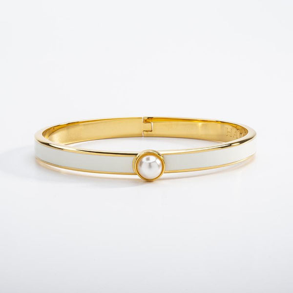 Load image into Gallery viewer, Halcyon Days &quot;Skinny Cabochon Pearl Cream &amp; Gold&quot; Bangle
