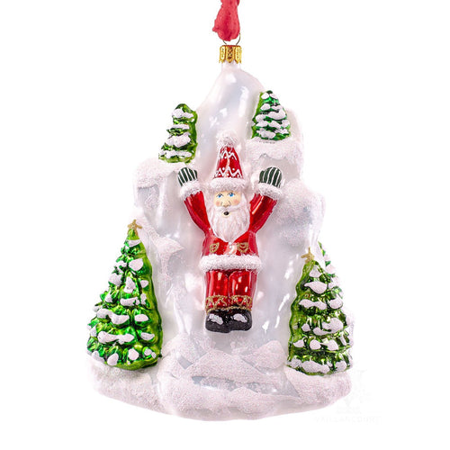 Vaillancourt Folk Art - Santa Sliding Down Mountain Ornament
