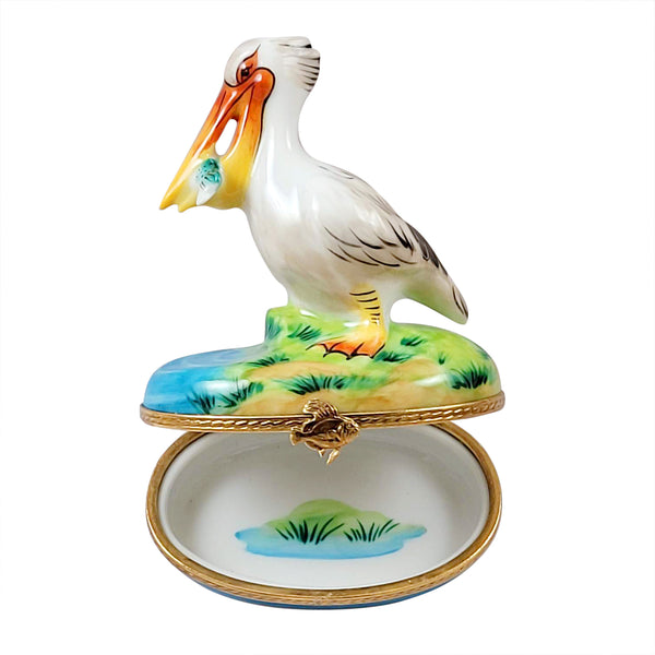 Load image into Gallery viewer, Rochard &quot;Pelican with Removable Fish&quot; Limoges Box
