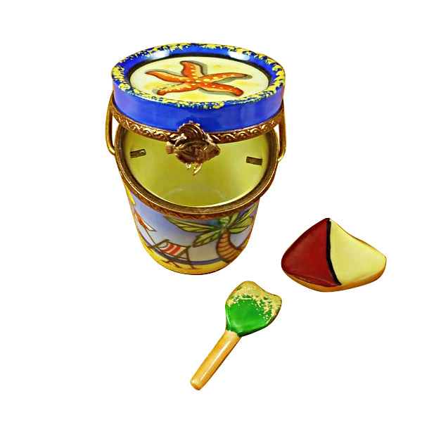 Load image into Gallery viewer, Rochard &quot;Beach Pail with Sailboat &amp; Shovel&quot; Limoges Box
