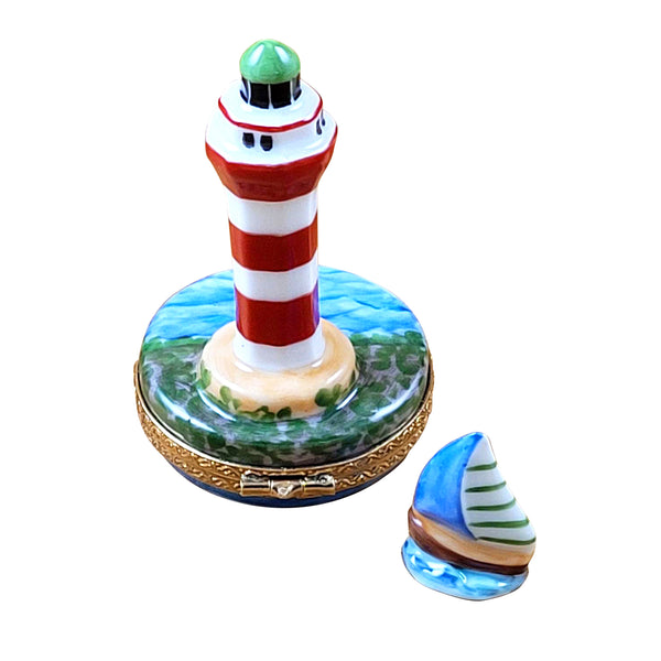 Load image into Gallery viewer, Rochard &quot;Hilton Head Lighthouse with Removable Porcelain Sailboat&quot; Limoges Box
