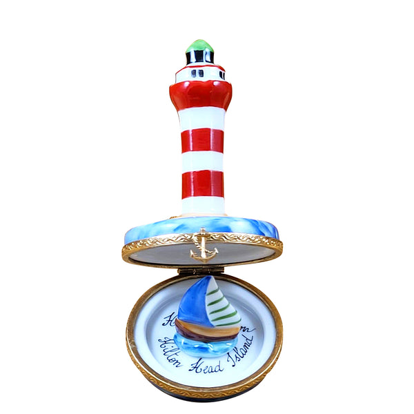 Load image into Gallery viewer, Rochard &quot;Hilton Head Lighthouse with Removable Porcelain Sailboat&quot; Limoges Box
