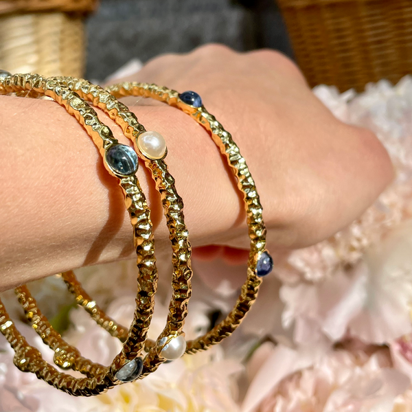 Load image into Gallery viewer, Halcyon Days - Cabochon  - Forget Me Not Blue Jewel - Gold  - Torque Bangle
