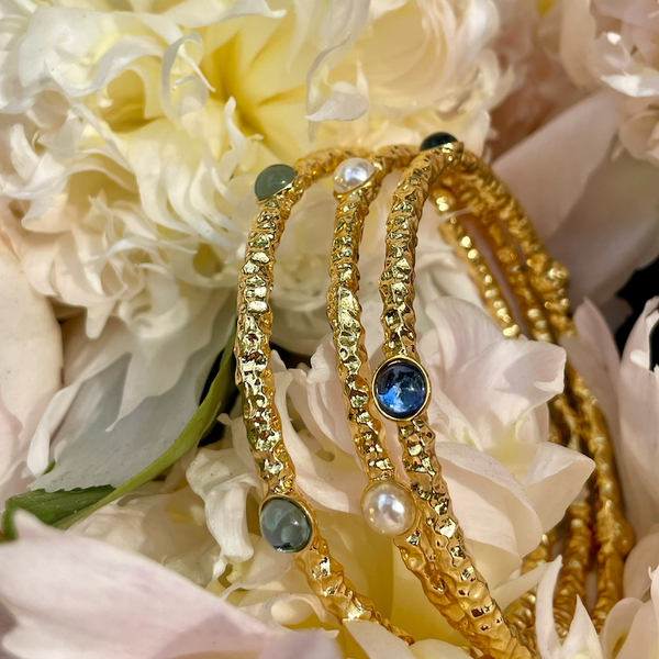 Load image into Gallery viewer, Halcyon Days - Cabochon  - Forget Me Not Blue Jewel - Gold  - Torque Bangle
